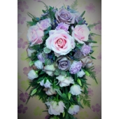 Sweet Avalanche and Amnesia rose, lisianthus, astrantia, lavender and veronica with asparagus fern, French ruscus and eucalyptus enhanced with diamanté pins.