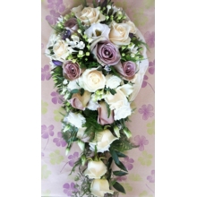 Amnesia & Vandela rose, bouvardia, lisianthus and veronica with asparagus fern, French ruscus and eucalyptus enhanced with crystal butterflies and diamanté pins.