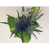 Eryngium with ivy leaves enhanced with blue and silver crystal butterfly.