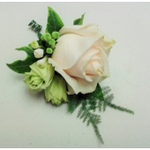 Vandela rose, lisianthus and bouvardia with asparagus fern and ivy leaves.