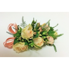Spray rose and bouvardia with asparagus fern enhanced with satin ribbon bows.