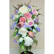 The Bride's Shower Bouquet - David Austin roses; O'Hara, Prince Jardiniere, Cafe Latte & Princess Charlene enhanced with sweet peas, lisianthus, million bells and asparagus fern.