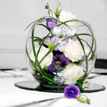 Akito rose, lisianthus and freesia with coordinating foliage, enhanced with diamanté and glass crystals.