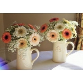 Gerbera and gypsophila table centres