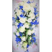 White Naomi rose, delphinium, bouvardia, lisianthus and veronica with asparagus fern and eucalyptus enhanced with diamanté pins and groups of pearls.