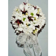 Pomander in spray chrysanthemum with leucadendron enhanced with voile ribbon.